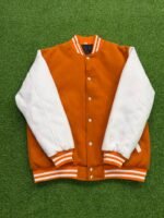 orange and white varsity jacket
