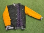 green and mustard varsity jacket