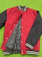 Red and black letterman jacket close up